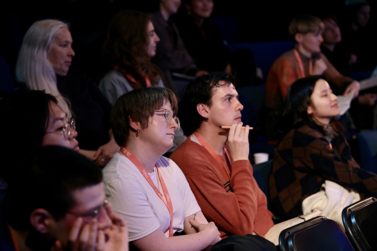 An audience listening at a festival